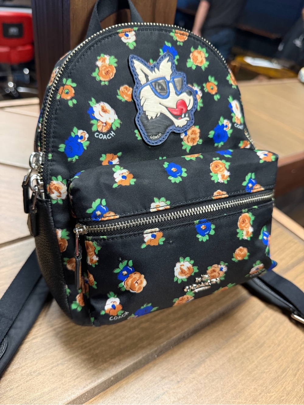 Coach Black Mini Charlie Backpack with Blue and Orange Floral Print